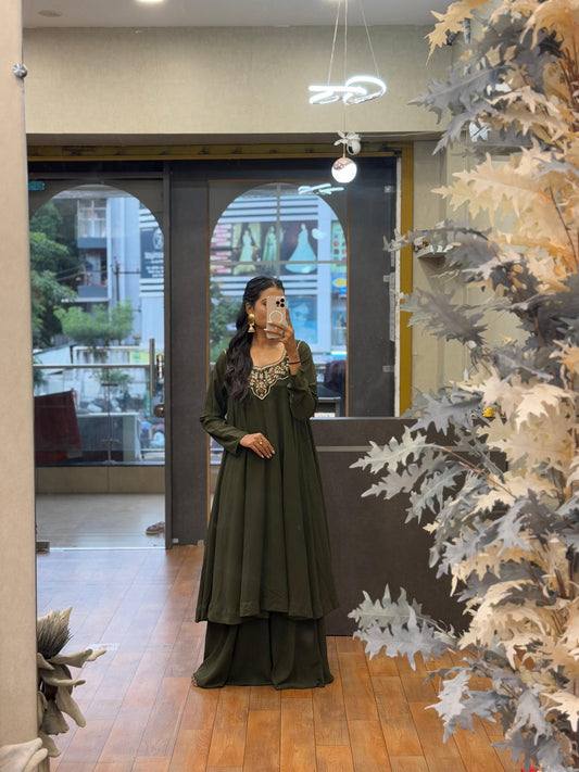 Elegant Green Embroidered Ethnic Dress with Golden Earrings