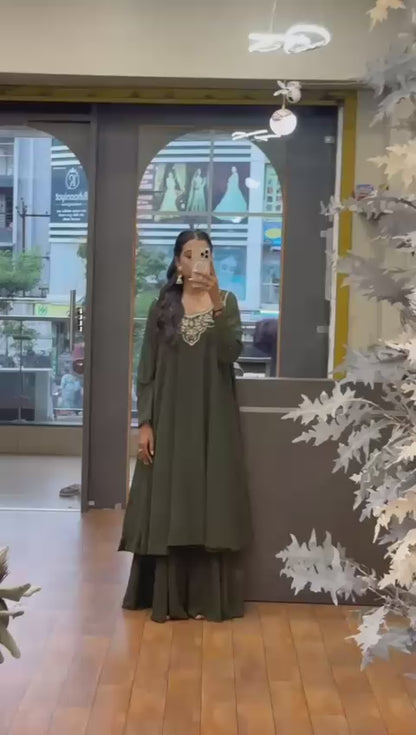 Elegant Green Embroidered Ethnic Dress with Golden Earrings
